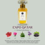 A 50ml Mosafa Aromatics perfume bottle labeled “Expo Qatar,” styled with a luxurious Oriental Fruity Woody theme and presented with warm, elegant tones.